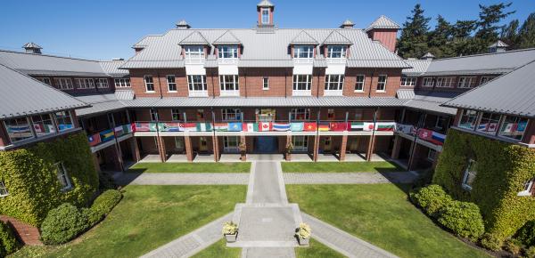 Country flags hanging from the railings on Crothall building