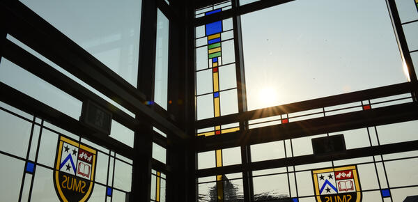 SMUS crests in stained glass on the Sun Centre