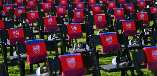 Rows of Jubilee hats and scarves on chairs waiting for the ceremony to begin