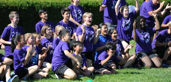 Middle School students cheering during house games