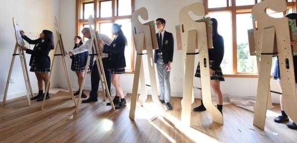 Senior School art class working on easels in Brown Hall