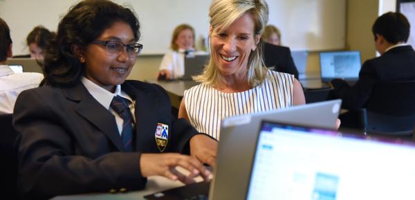 Senior School student and teacher in the classroom