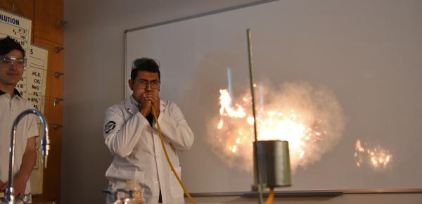 Senior School science teacher conducting a classroom experiment
