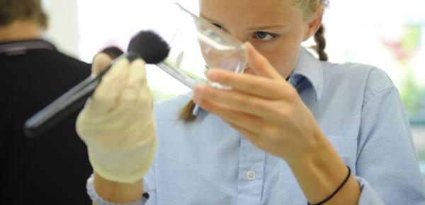 Senior School student conducting a science experiment in the lab