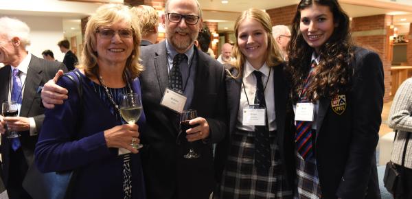 Group of students and alumni at event