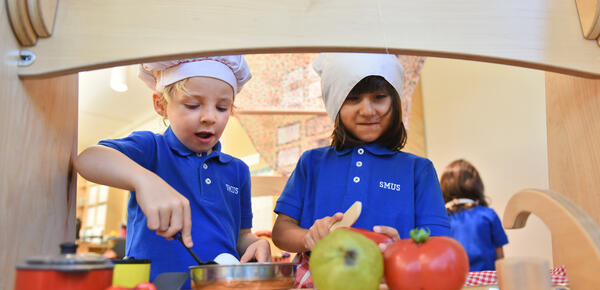 Junior Kindergarten students enjoying cooking together