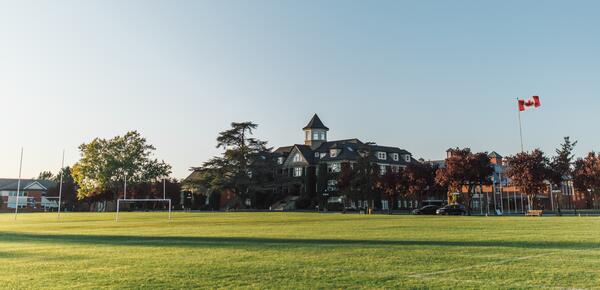 A view of the School House building from the playing field. 