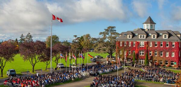 A wide shot of a full campus during a ceremony 