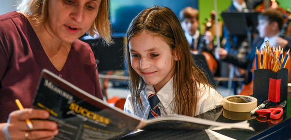 Junior School students learn in strings class 