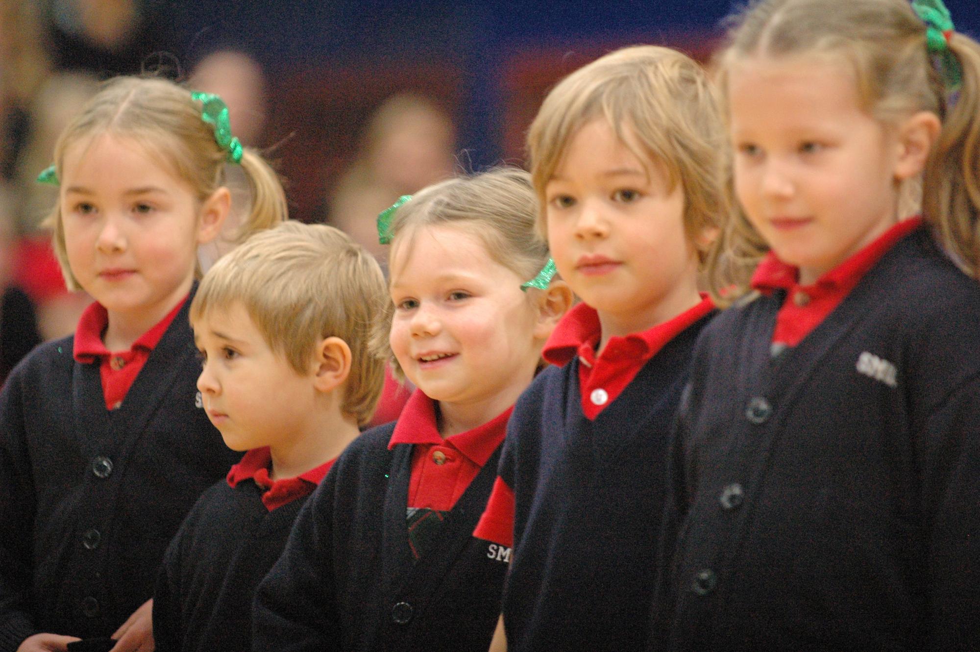 Kindergarten students perform during the All-School Christmas Assembly