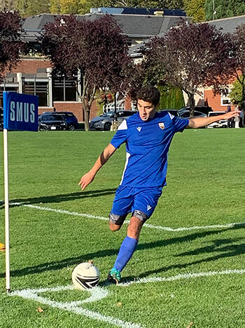 A player taking a corner kick