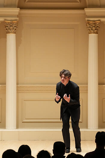 Liam performs on stage at Carnegie Hall