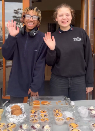 Girl Up members at bake sale