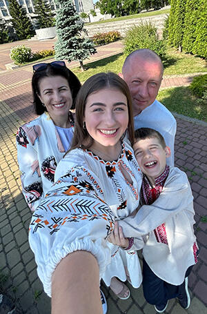 Ilona takes a selfie with her family