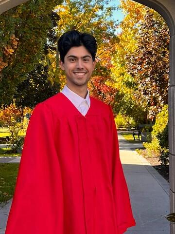 Aaron Gill ’25 in choir uniform after performing at World Series Game 1 in Toronto.