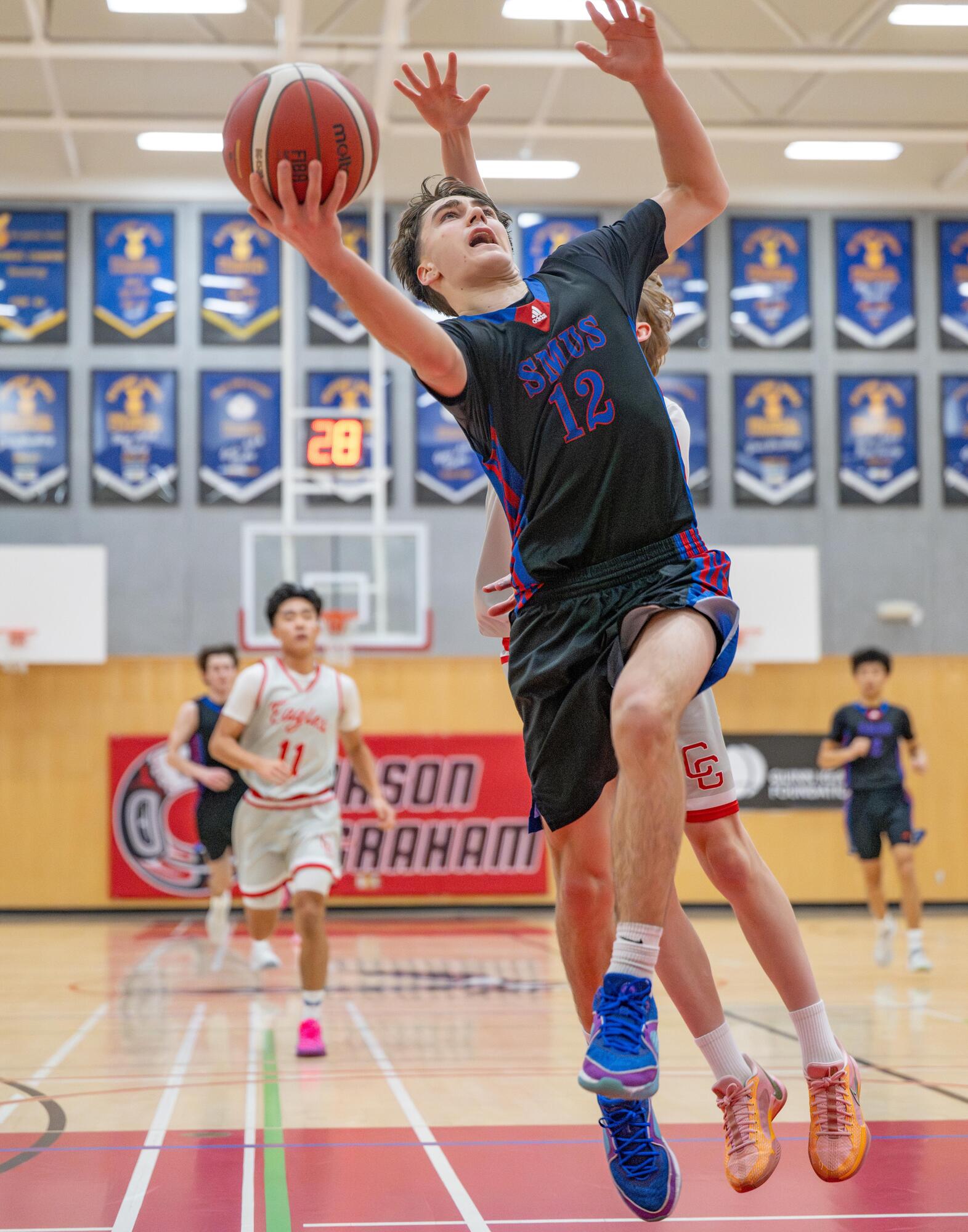 SMUS Senior boys basketball player Will Bateson