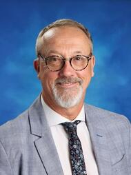 A portrait of Adrian French