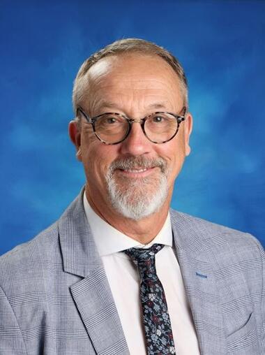 A portrait of Adrian French