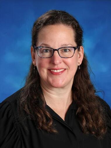 A portrait of Kirsten De Launiere