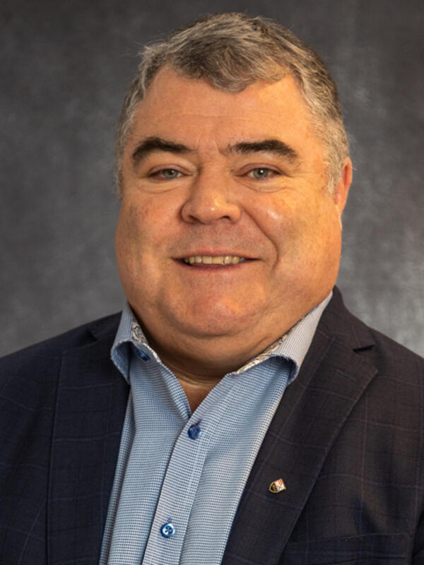 A portrait of John MacKay