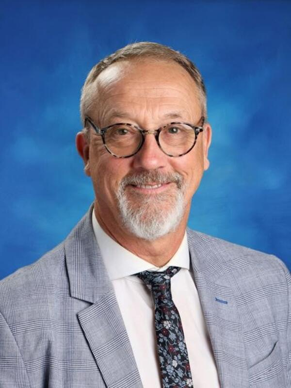 A portrait of Adrian French