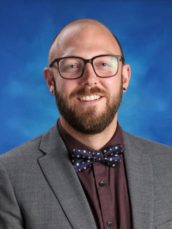 A portrait of Sam Stewart