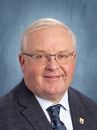 A portrait of Richard DeMerchant