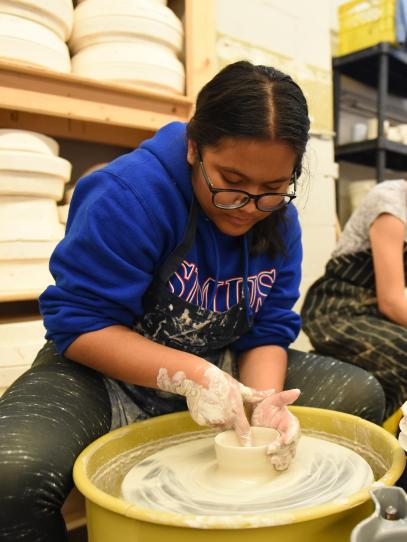 Senior School students using the pottery wheel