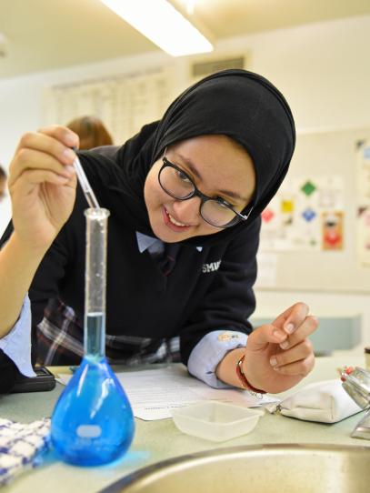 Senior School student conducting a science experiment in the lab