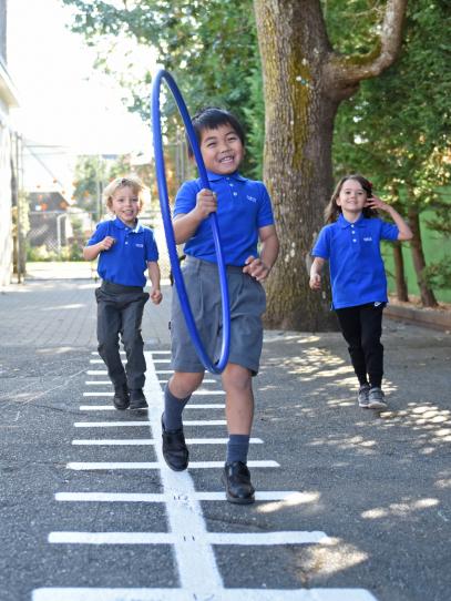 Junior Kindergarten Students Playing Outside 