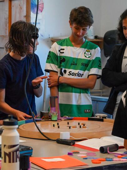 Engineering Camper showing other camps the project they have been working on for two weeks