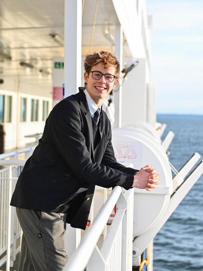 Middle Henri Jungkind leans on a BC Ferries railing
