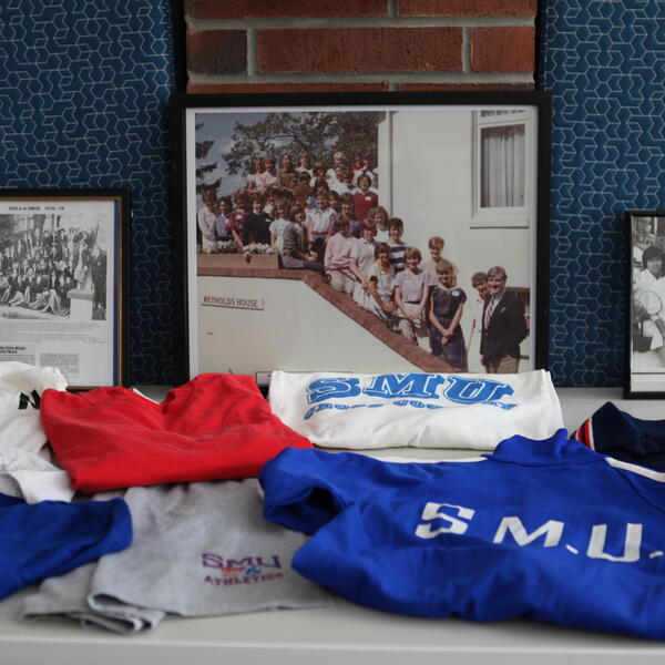 A table with memorabilia from the first intake of girls to SMUS