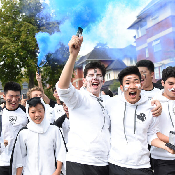 Boarding students celebrating a big win