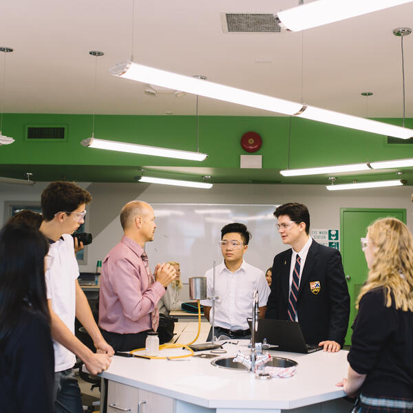 Senior School class in the science lab with teacher
