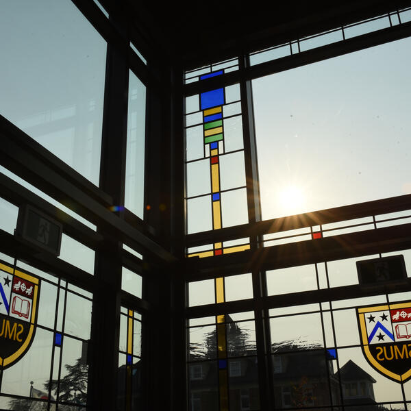 SMUS crests in stained glass on the Sun Centre