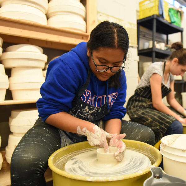 Senior School students using the pottery wheel
