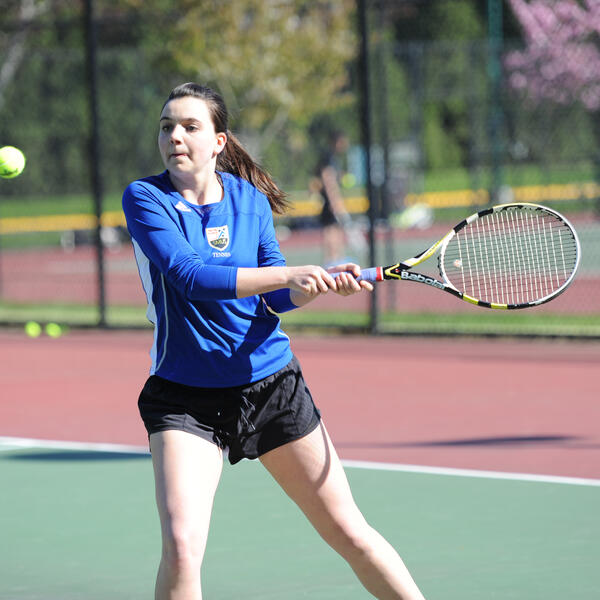 Senior School athlete playing tennis