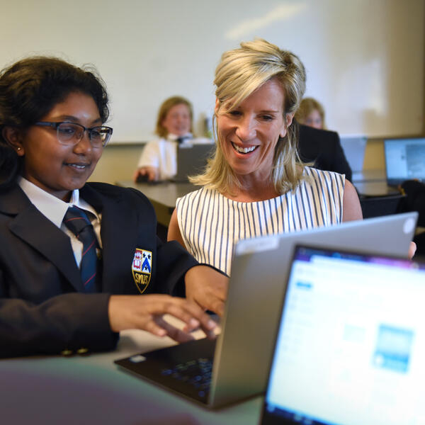Senior School student and teacher in the classroom