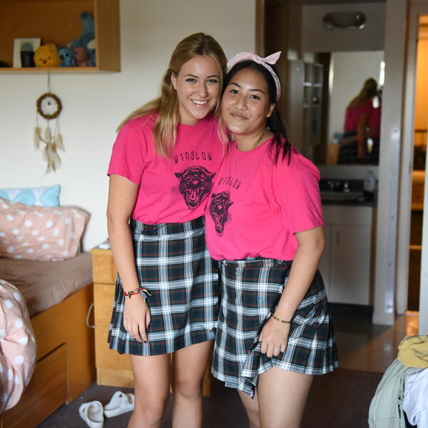 Two Senior School boarding students pose in their room.