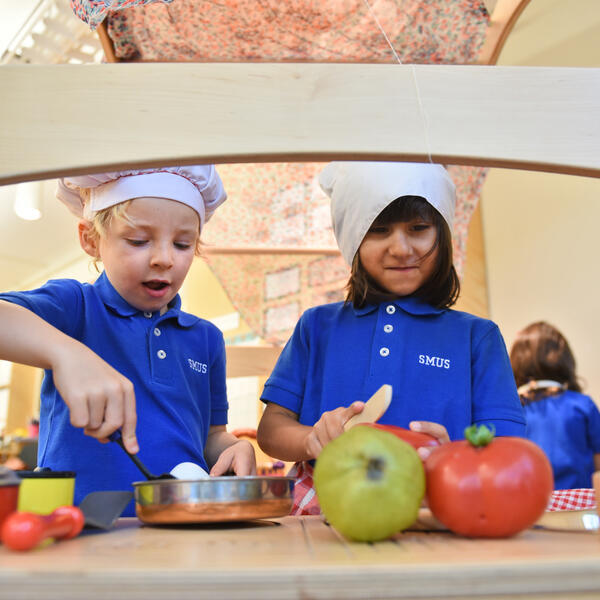 Junior Kindergarten students enjoying cooking together