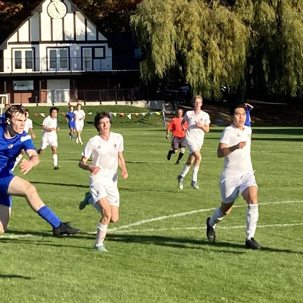 A SMUS player takes a shot at goal