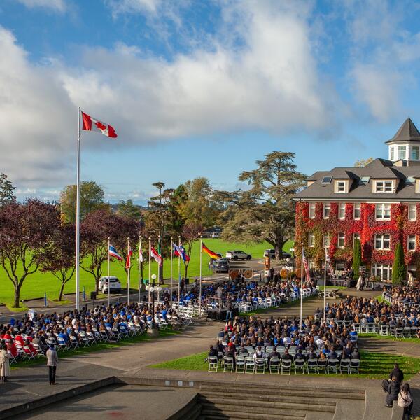 A wide shot of a full campus during a ceremony 