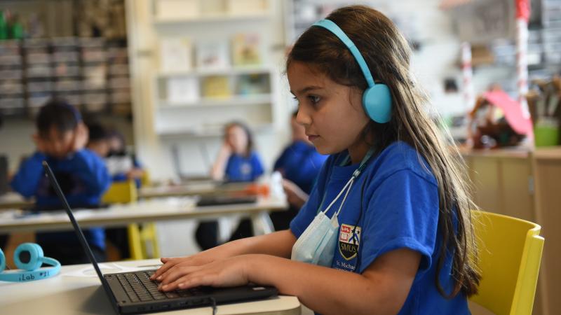 Junior School student using laptop in the Imagination Lab