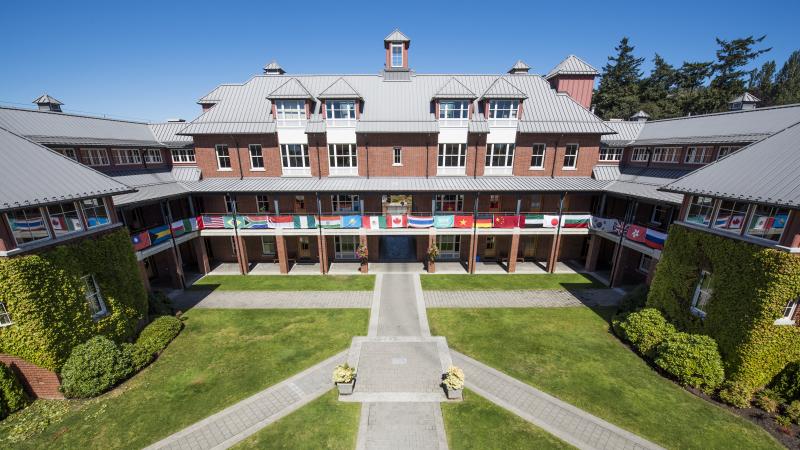 Country flags hanging from the railings on Crothall building