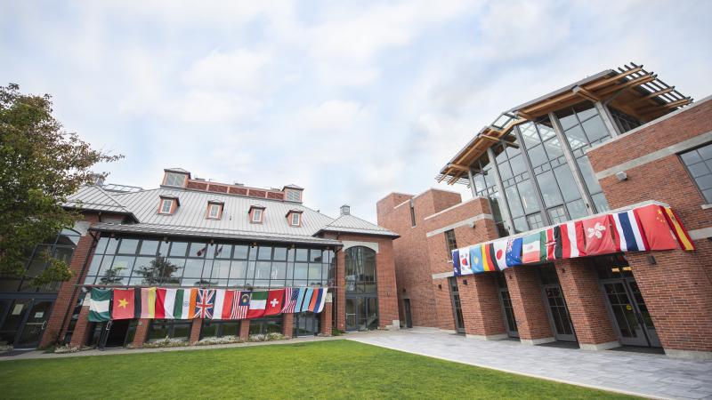 Country flags hanging from Schaffter and Sun Centre buildings