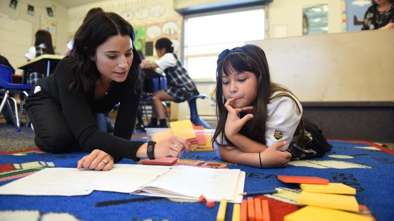 Junior School student and teacher in the classroom