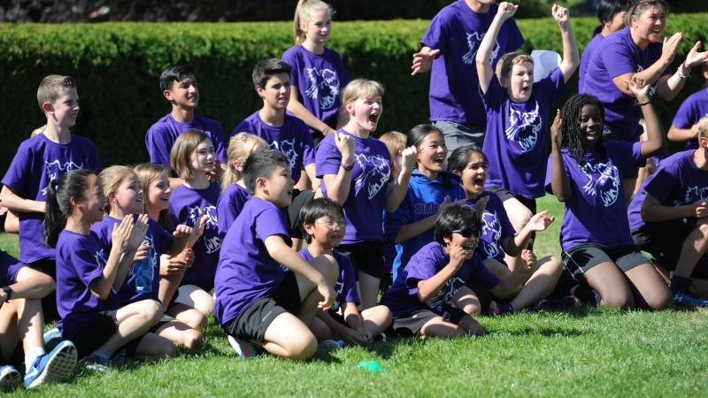 Middle School students cheering during house games