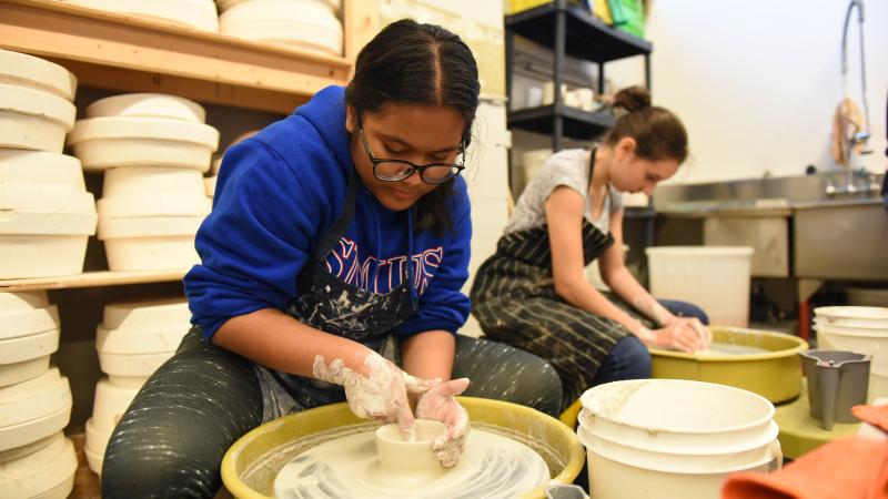 Senior School students using the pottery wheel