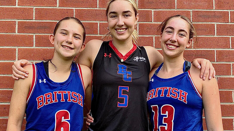 Athletes Avery, Makena and Charlie pose with their Team BC basketball jerseys